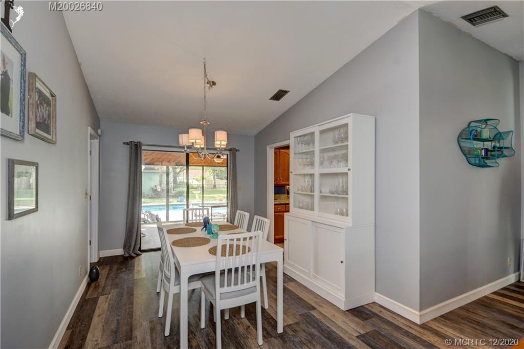 1654 Southwest 85th Terrace Stuart, FL 34997 - Photo 8 of 48 a view of a dining room with furniture window and outside view