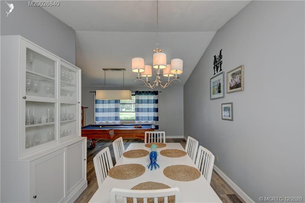1654 Southwest 85th Terrace Stuart, FL 34997 - Photo 10 of 48 a dining room with furniture and window