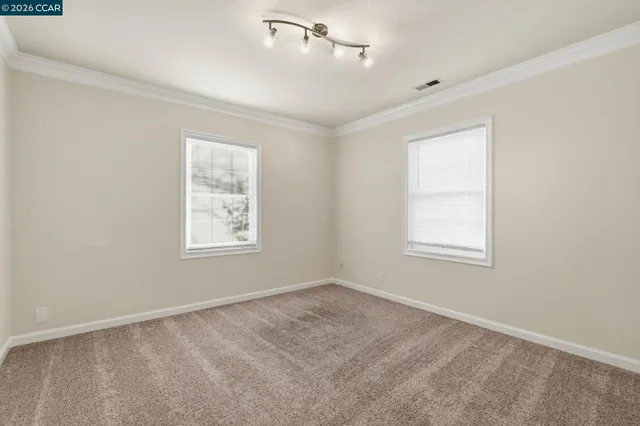 an empty room with a bathroom