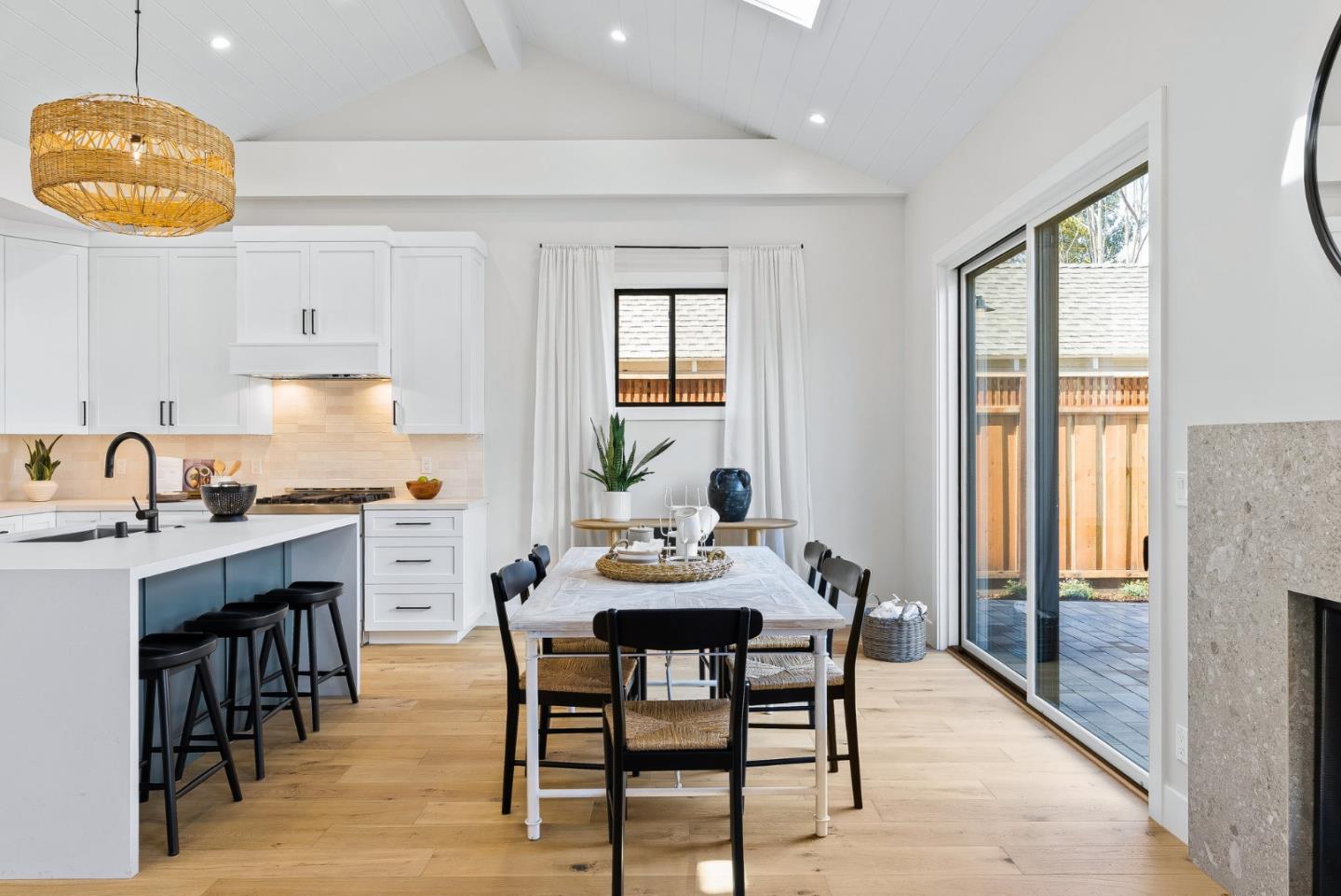 4875 Opal Street Capitola, CA 95010 - Photo 13 of 49 a view of a dining room with furniture and window