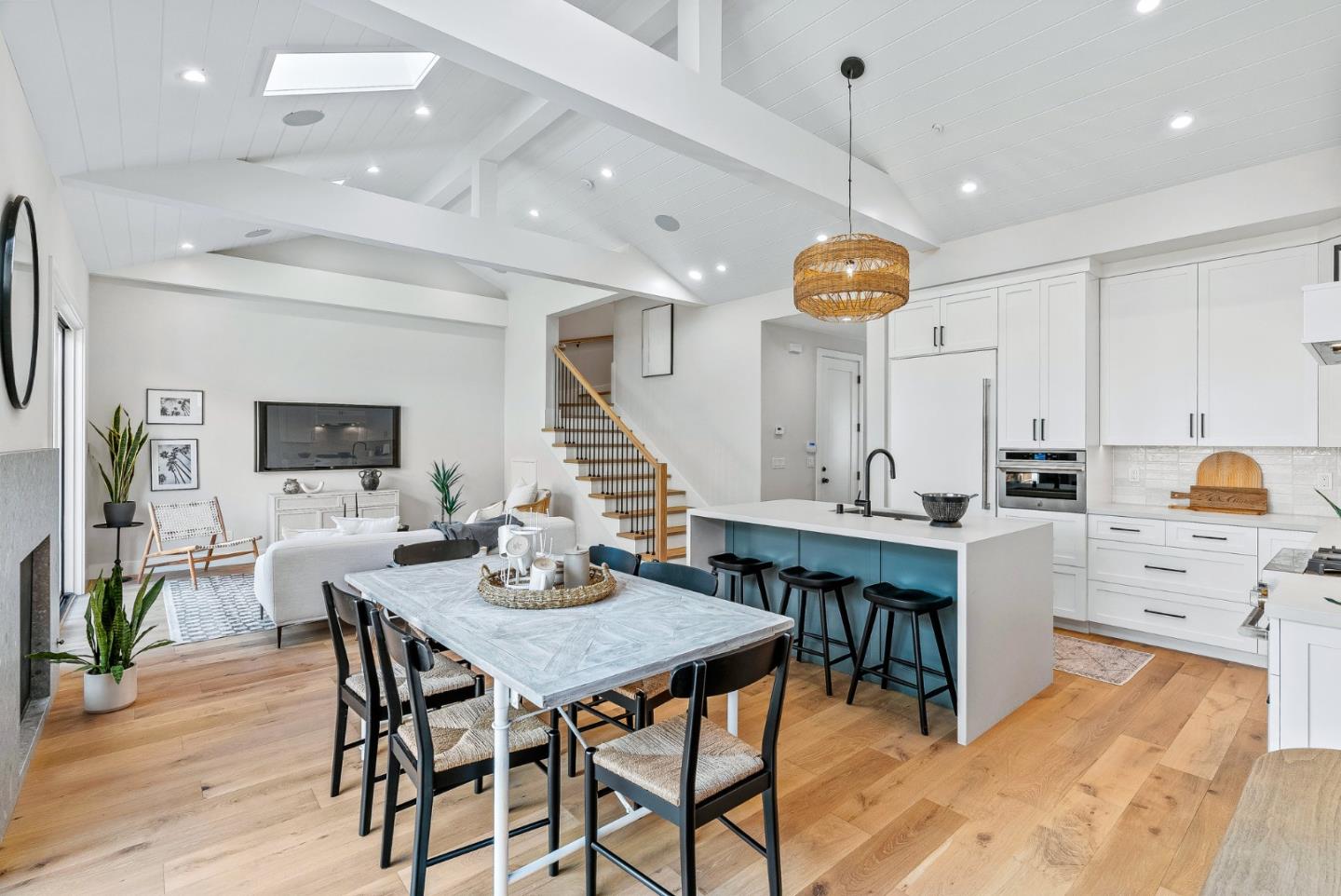 4875 Opal Street Capitola, CA 95010 - Photo 22 of 49 a room with stainless steel appliances kitchen island a dining table and chairs