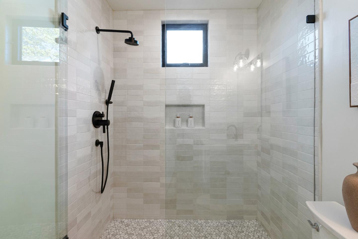 4875 Opal Street Capitola, CA 95010 - Photo 26 of 49 a bathroom with a shower