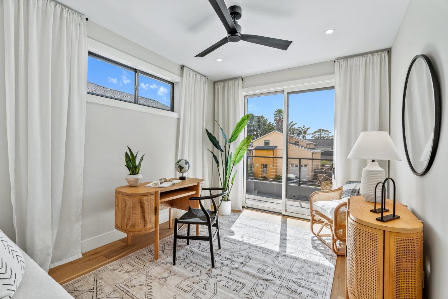 4875 Opal Street Capitola, CA 95010 - Photo 29 of 49 a living room with furniture a dining table and a potted plant