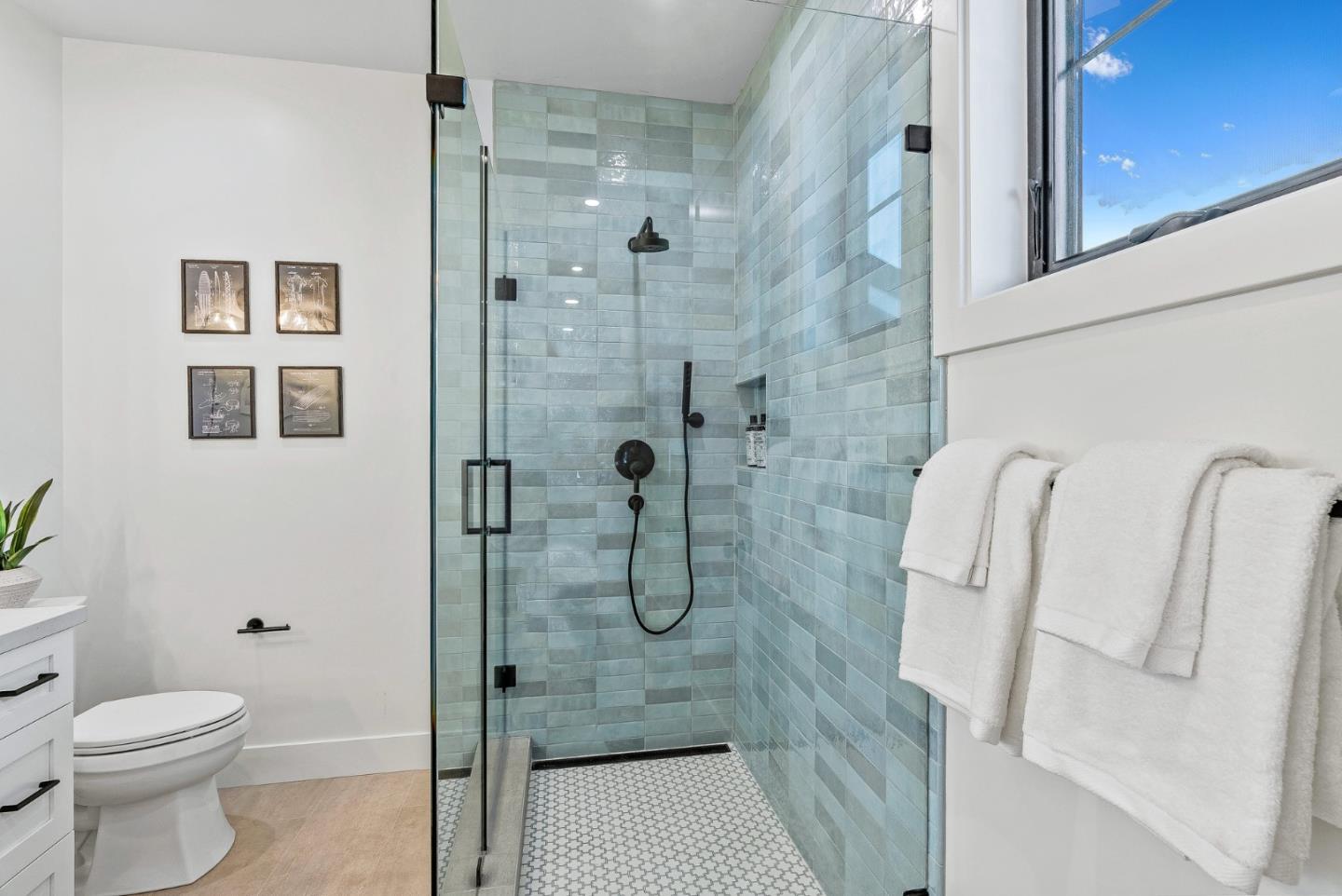 4875 Opal Street Capitola, CA 95010 - Photo 37 of 49 a bathroom with a shower and toilet