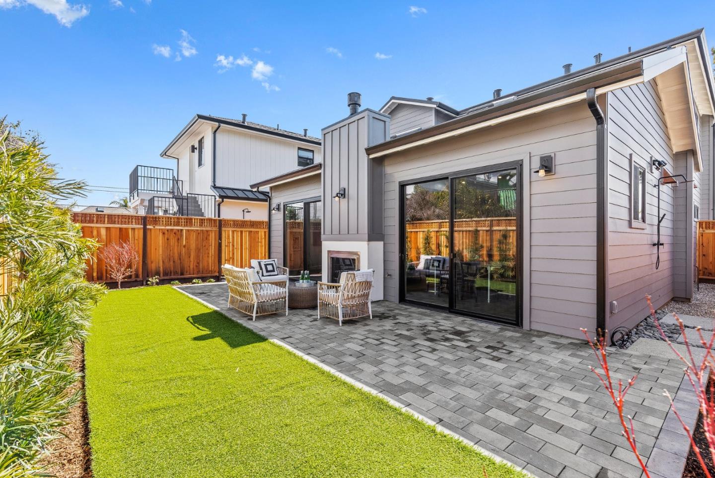 4875 Opal Street Capitola, CA 95010 - Photo 38 of 49 a view of a house with backyard and sitting area