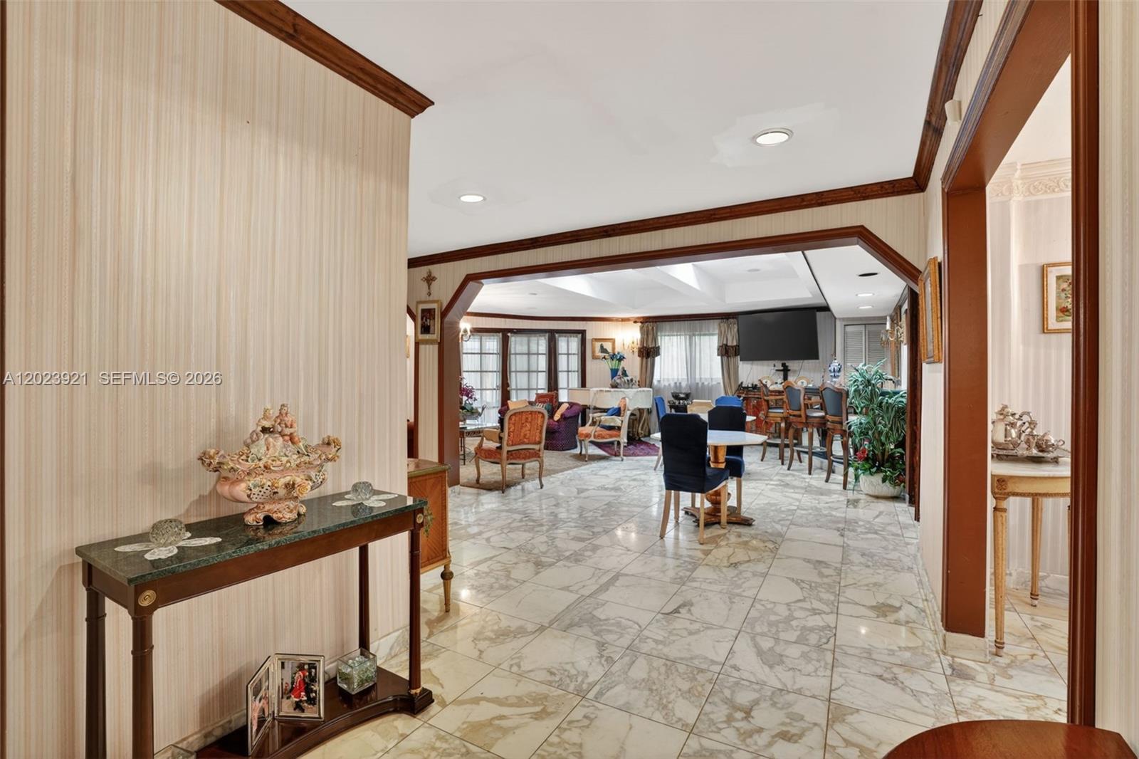 8461 Southwest 68th St Road Miami, FL 33143 - Photo 37 of 65 a view of a hallway with seating area