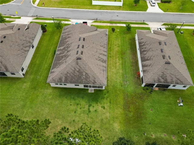 a view of a swimming pool and an outdoor seating