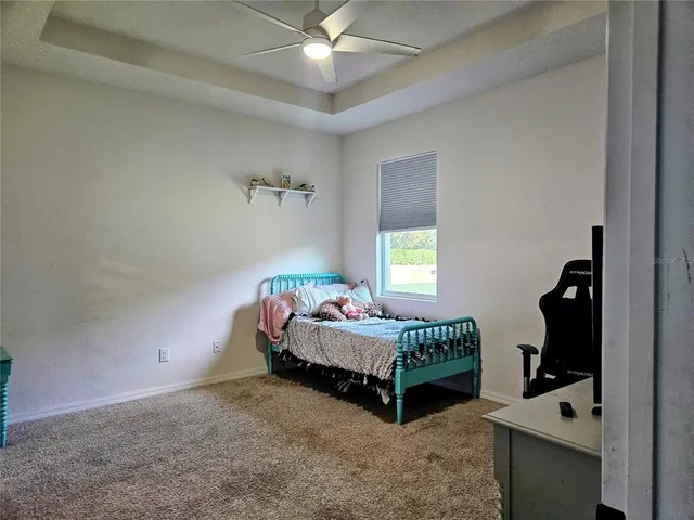 a view of a hallway with a door