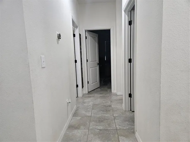 a view of a hallway with elevator
