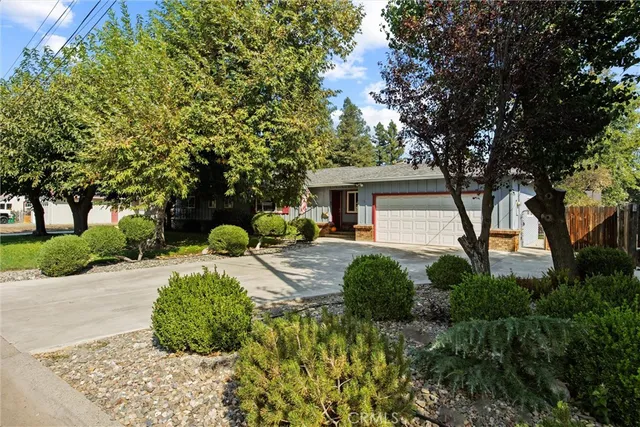 a house view with a backyard space