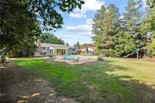 a view of a house with a big yard