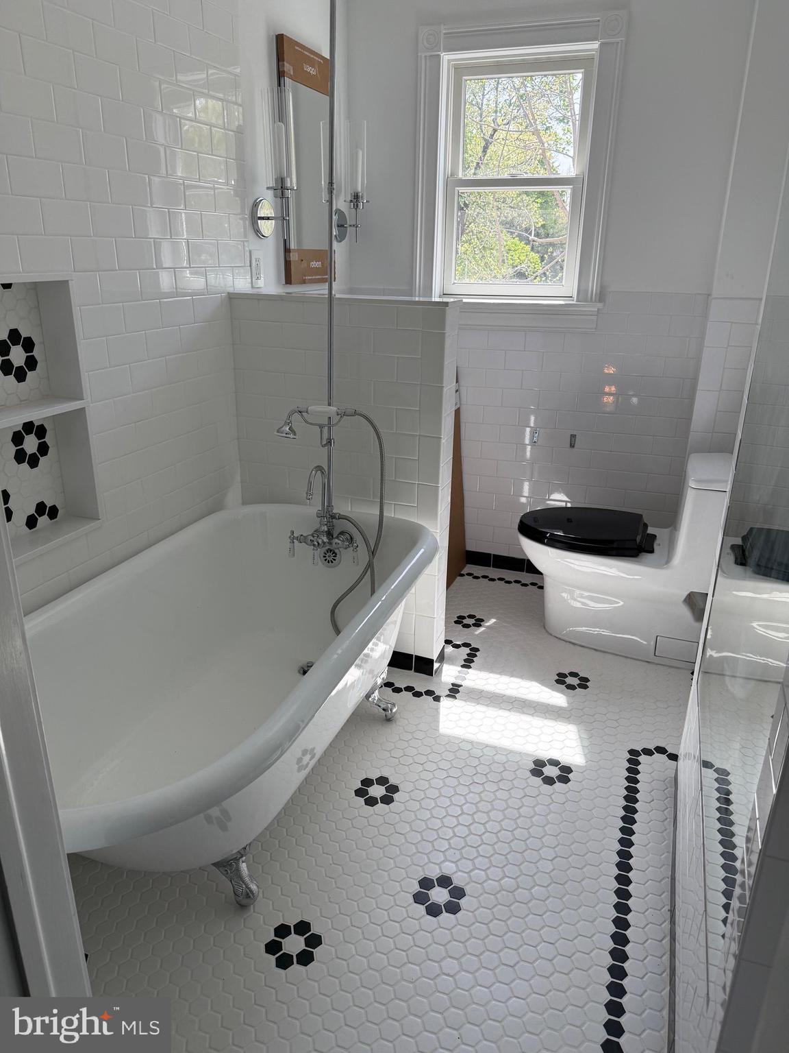 28 Bank Street Princeton, NJ 08542 - Photo 12 of 18 a bathroom with a sink and toilet
