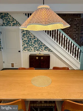 a view of swimming pool with outdoor seating