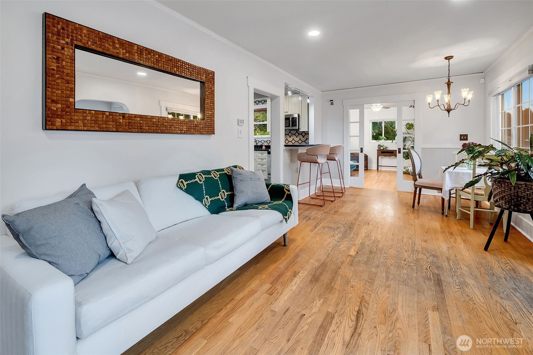 2726 50th Avenue Southwest Seattle, WA 98116 - Photo 12 of 40 a living room with furniture and a wooden floor