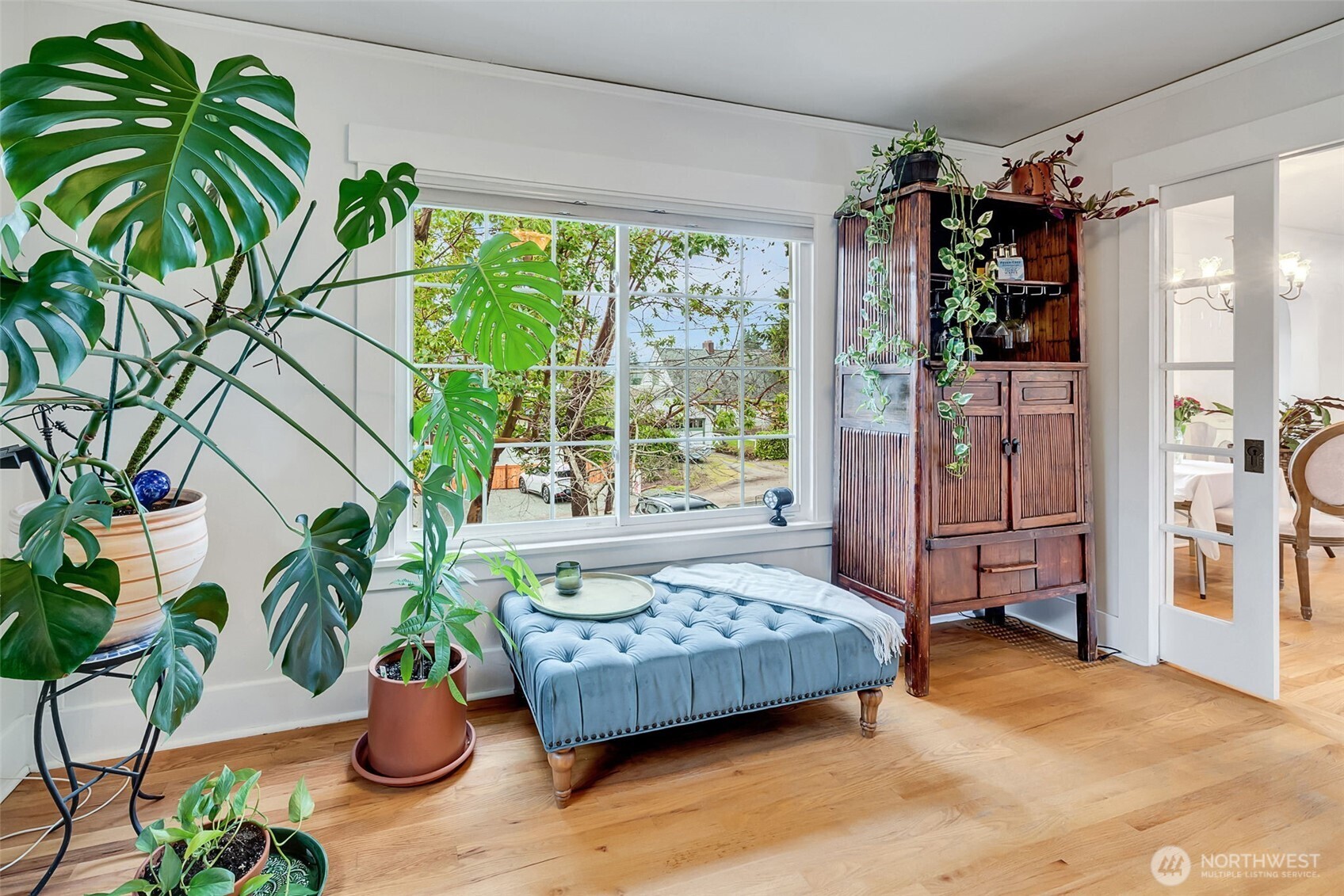 2726 50th Avenue Southwest Seattle, WA 98116 - Photo 15 of 40 a bedroom with bed and a potted plant