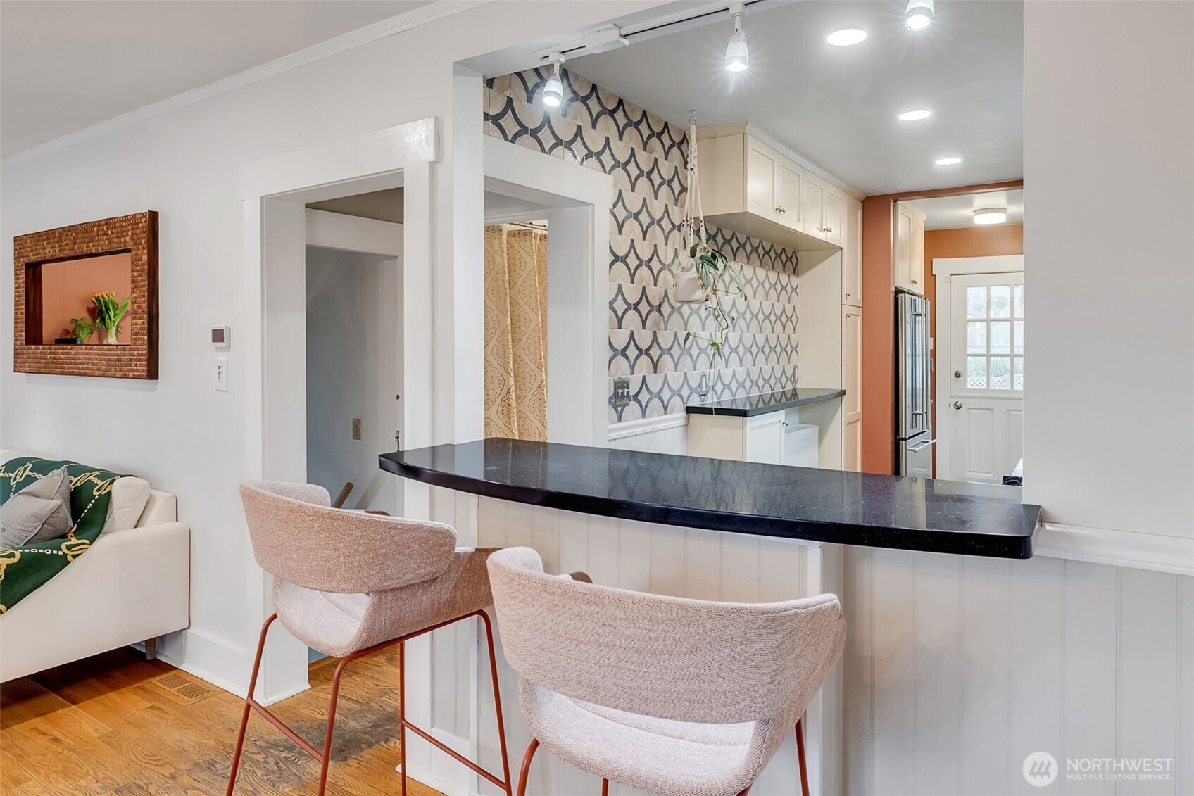 2726 50th Avenue Southwest Seattle, WA 98116 - Photo 18 of 40 a living room with furniture and a large window