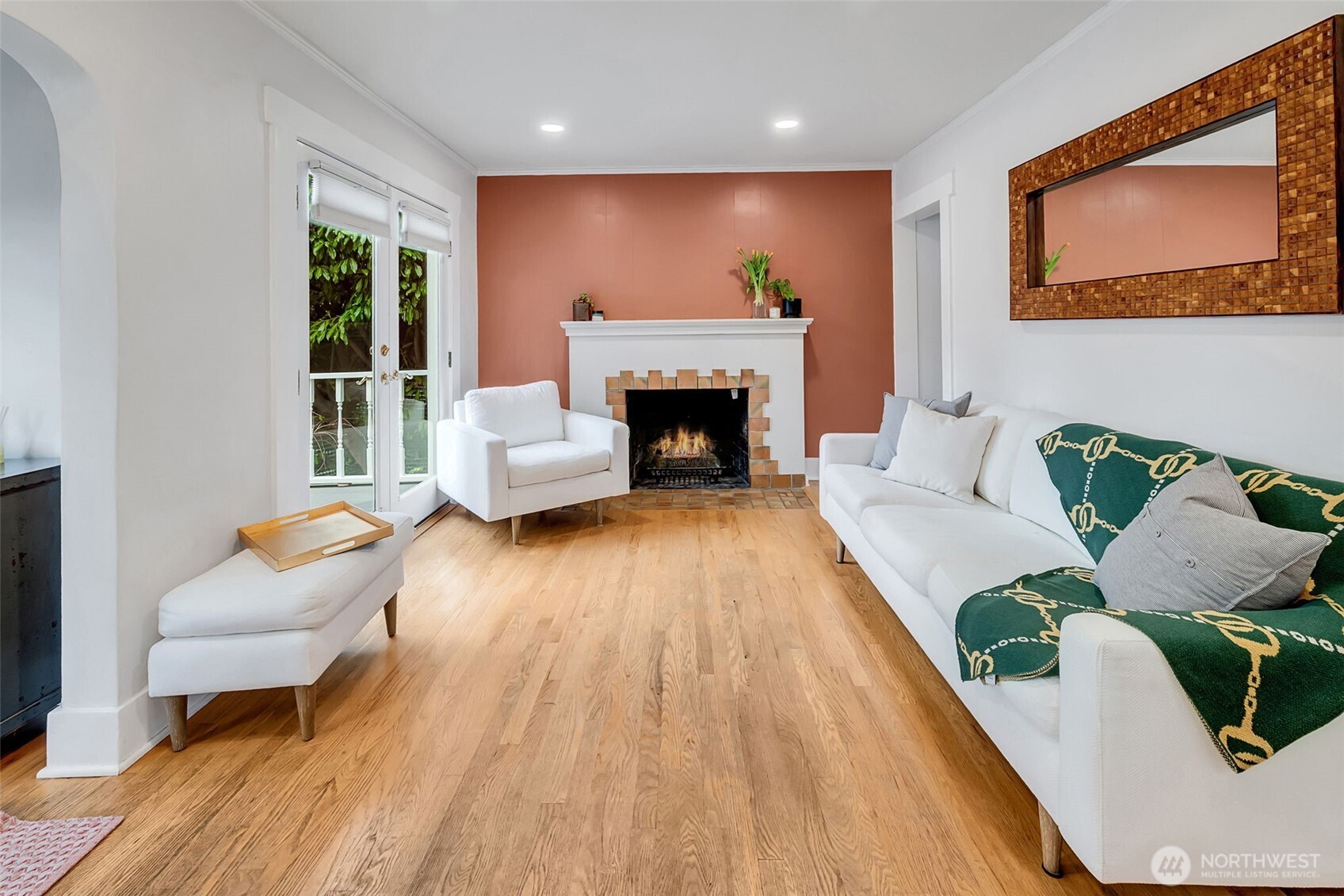 2726 50th Avenue Southwest Seattle, WA 98116 - Photo 8 of 40 a living room with furniture and a fireplace