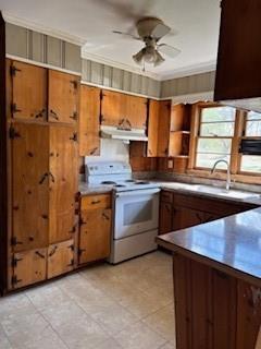 309 Crest Drive Calhoun, GA 30701 - Photo 11 of 23 a kitchen with a stove a sink and a refrigerator
