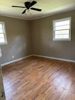 309 Crest Drive Calhoun, GA 30701 - Photo 15 of 23 a view of an empty room with wooden floor and a window