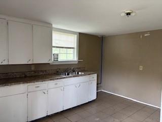 309 Crest Drive Calhoun, GA 30701 - Photo 18 of 23 a bathroom with a sink and a mirror