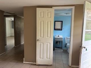 309 Crest Drive Calhoun, GA 30701 - Photo 19 of 23 a bathroom with a sink and a mirror