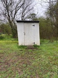 309 Crest Drive Calhoun, GA 30701 - Photo 23 of 23 a backyard of a house with lots of green space