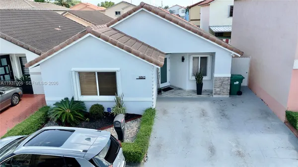 a view of a house with patio