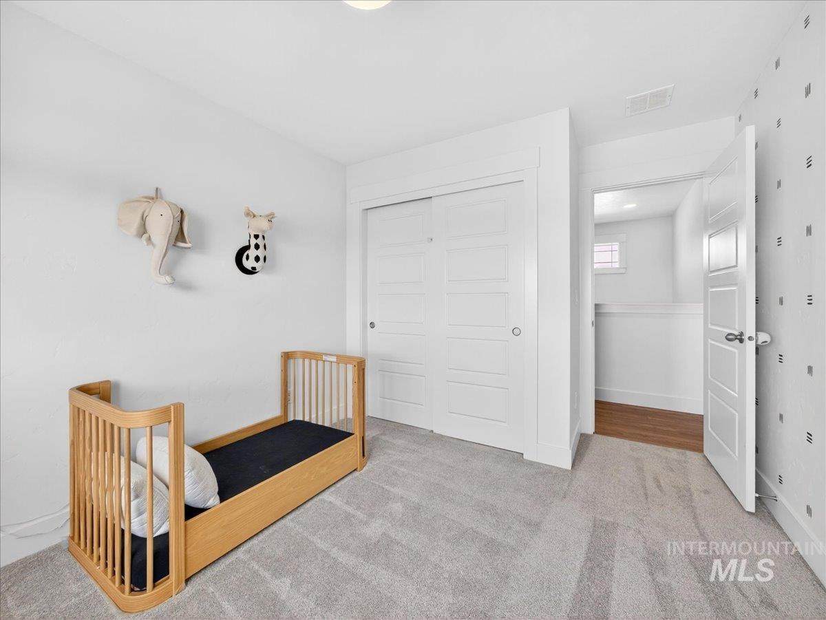 1811 Rome Avenue Emmett, ID 83617 - Photo 36 of 50 Interior room featuring light-colored carpeting and white walls
