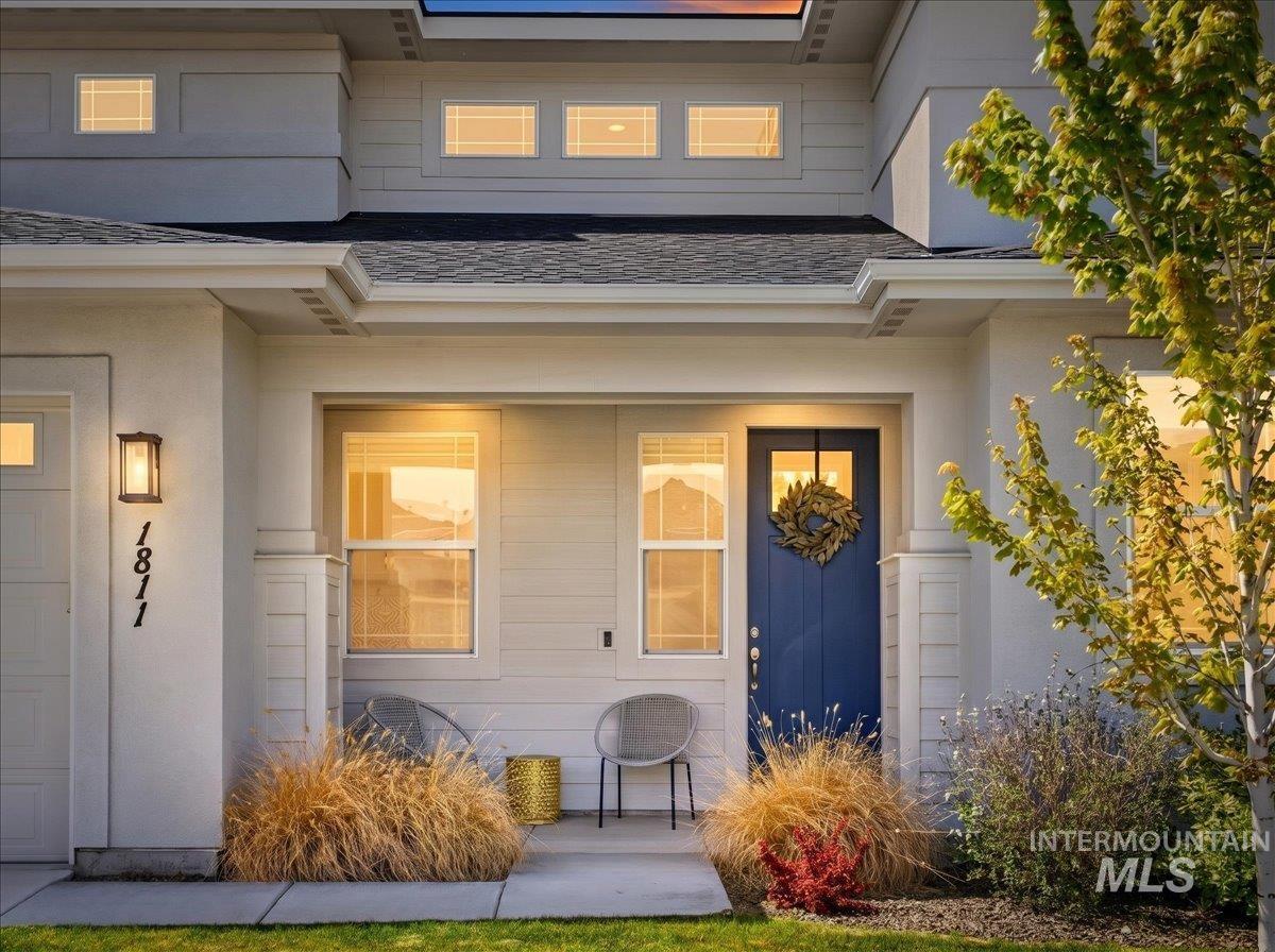 1811 Rome Avenue Emmett, ID 83617 - Photo 4 of 50 Contemporary exterior with a bold blue entry door and transom window