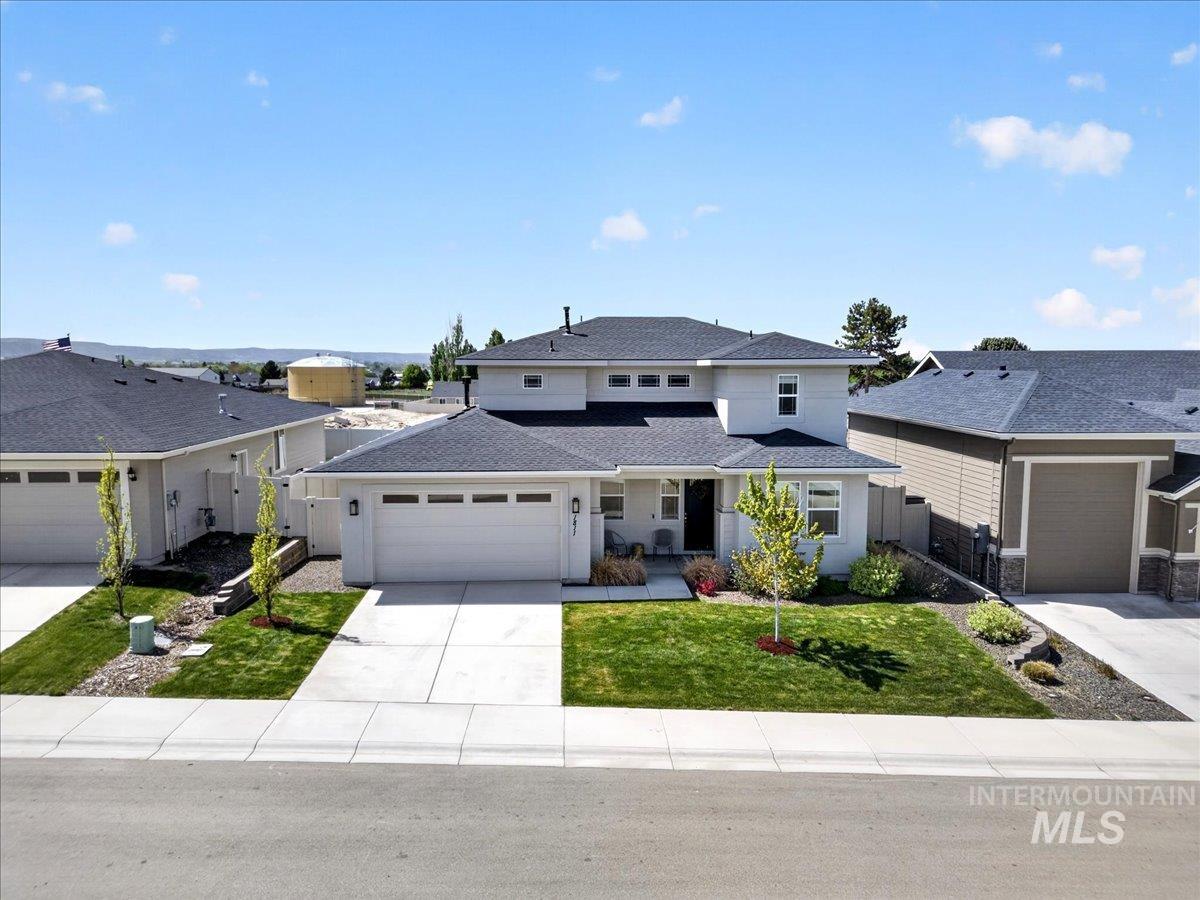 1811 Rome Avenue Emmett, ID 83617 - Photo 47 of 50 Contemporary two-story residence featuring a light-toned exterior with dark roofing