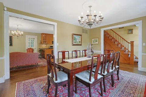 a view of a dining room with furniture