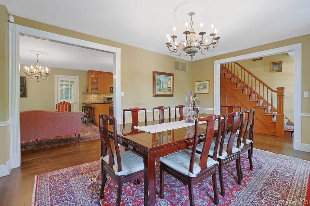 97 Underhill Road Scarsdale, NY 10583 - Photo 11 of 39 a view of a dining room with furniture