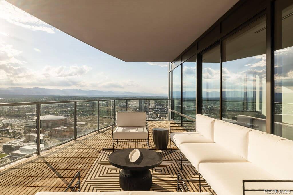 a outdoor space with patio the couches and dining table with garden view