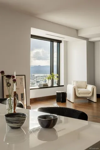 a living room with couch and a window