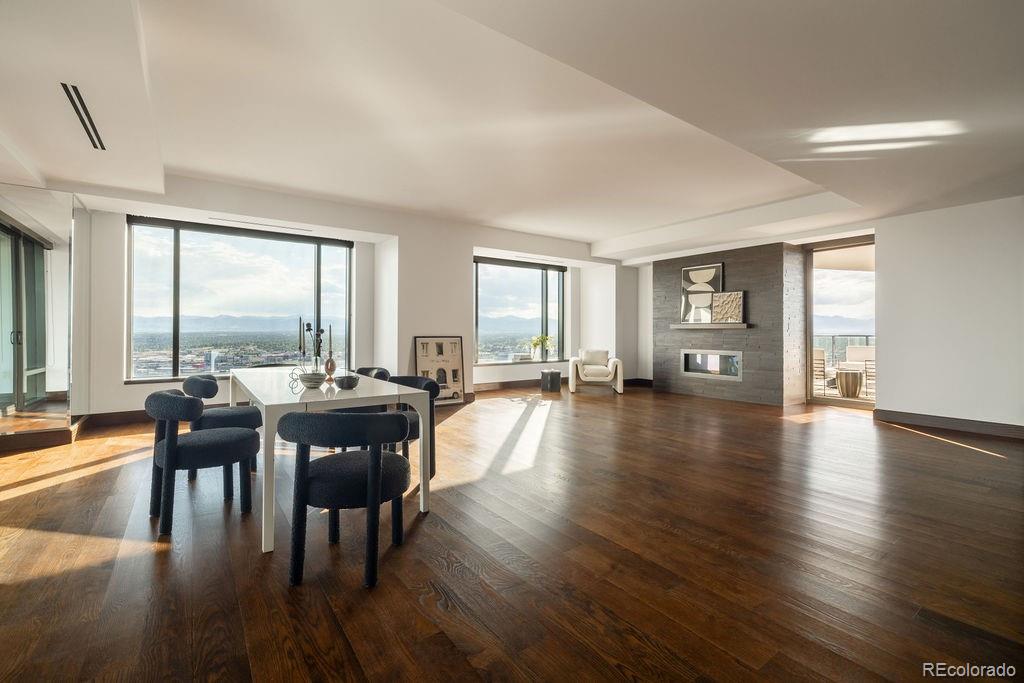 1133 14th Street, Unit 3700 Denver, CO 80202 - Photo 25 of 48 a view of a dining room with furniture window and wooden floor