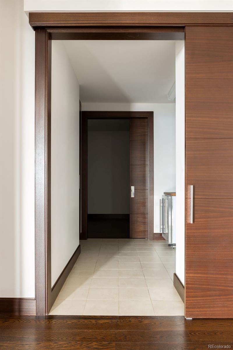1133 14th Street, Unit 3700 Denver, CO 80202 - Photo 30 of 48 a view of an entryway with wooden floor