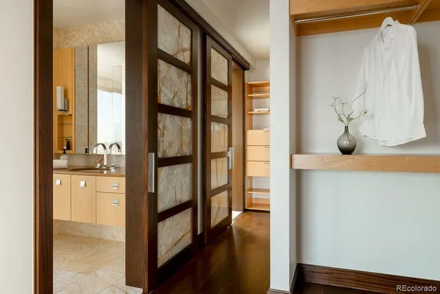 a bathroom with a shower and a window