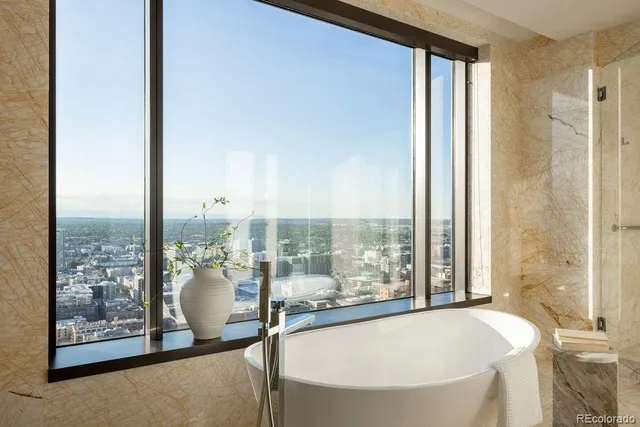 a view of a large window and a living room