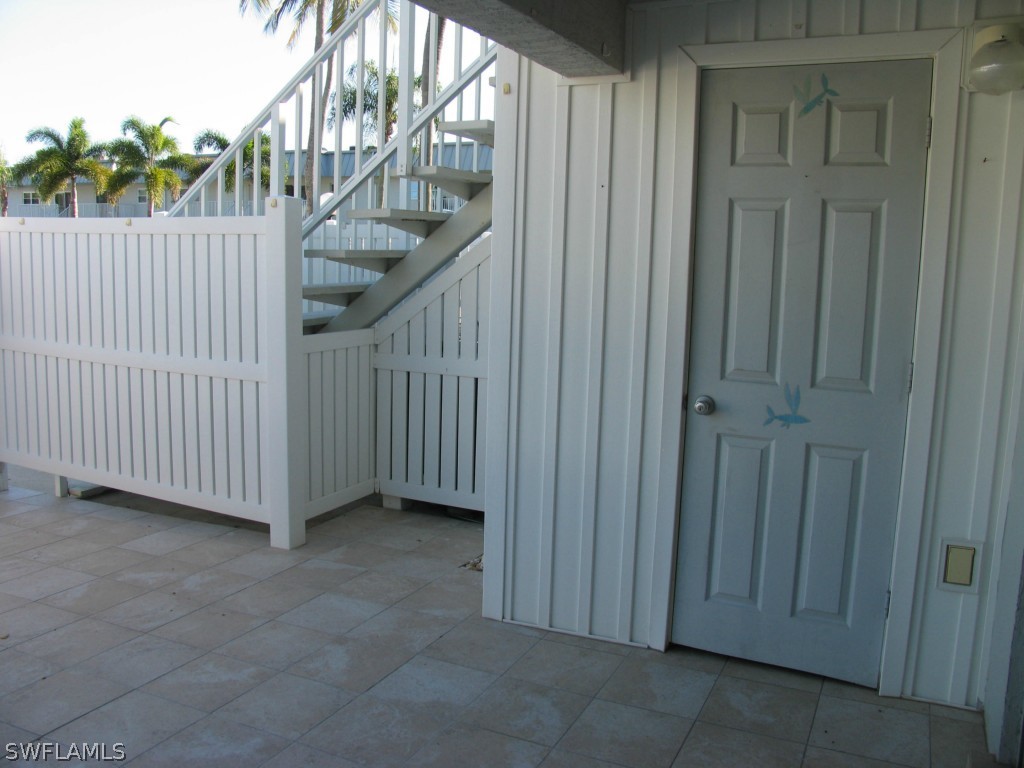 6777 Winkler Road, Unit D149 Fort Myers, FL 33919 - Photo 18 of 24 a view of a porch