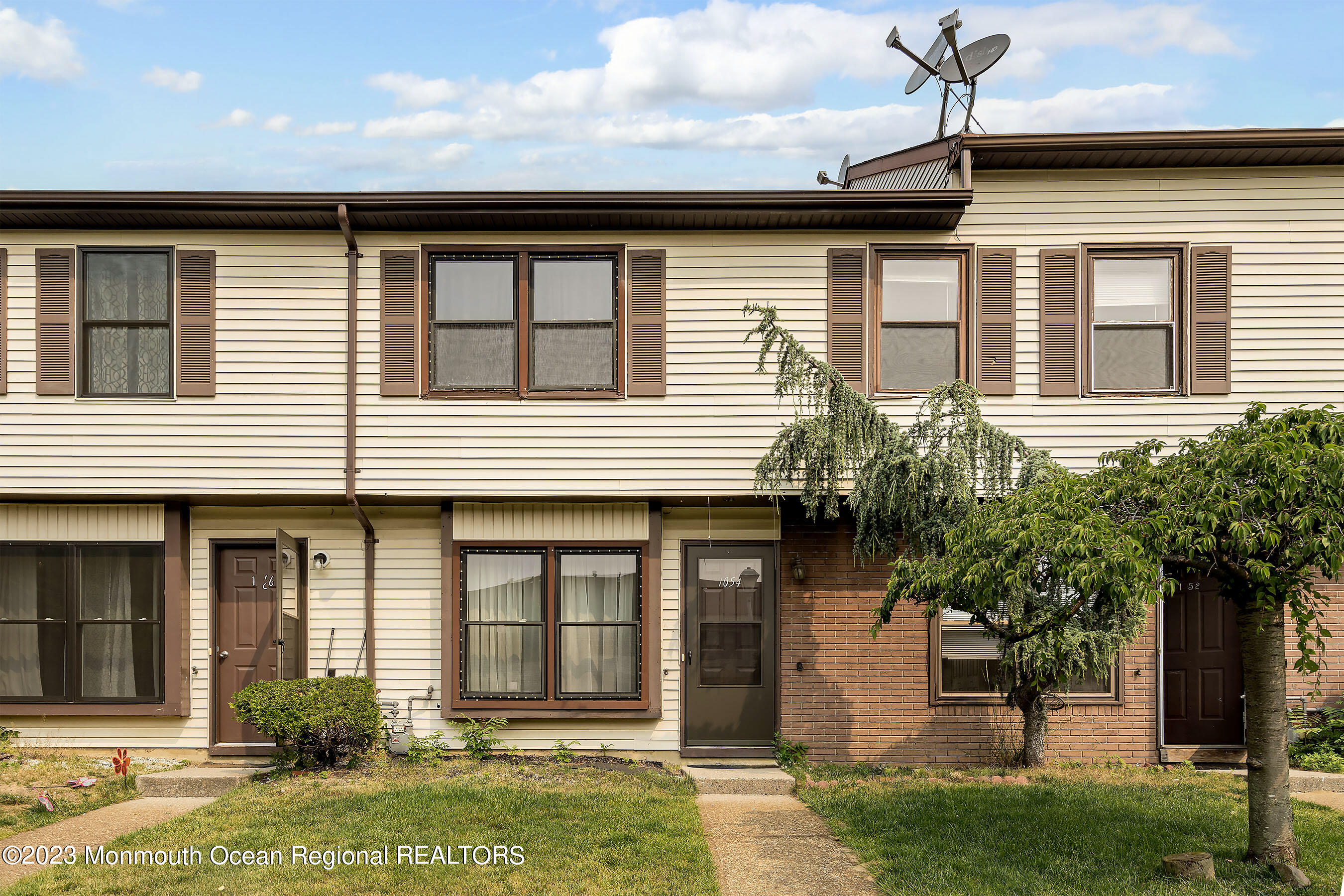 1054 Sawmill Road Brick, NJ 08724 - Photo 1 of 18 front view of a house