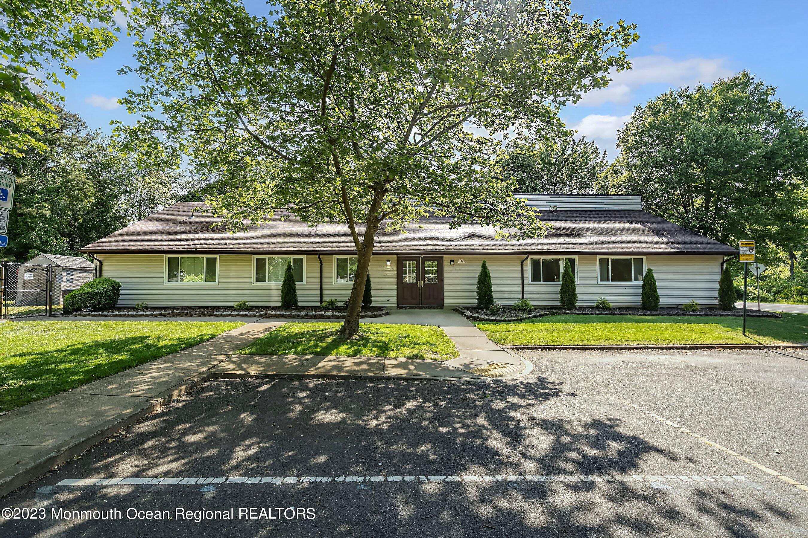 1054 Sawmill Road Brick, NJ 08724 - Photo 18 of 18 a view of a house with swimming pool and a yard