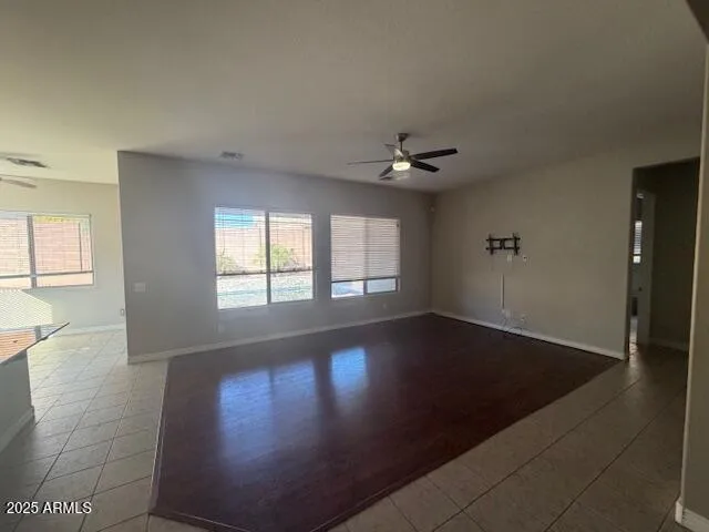 a view of an empty room with glass door