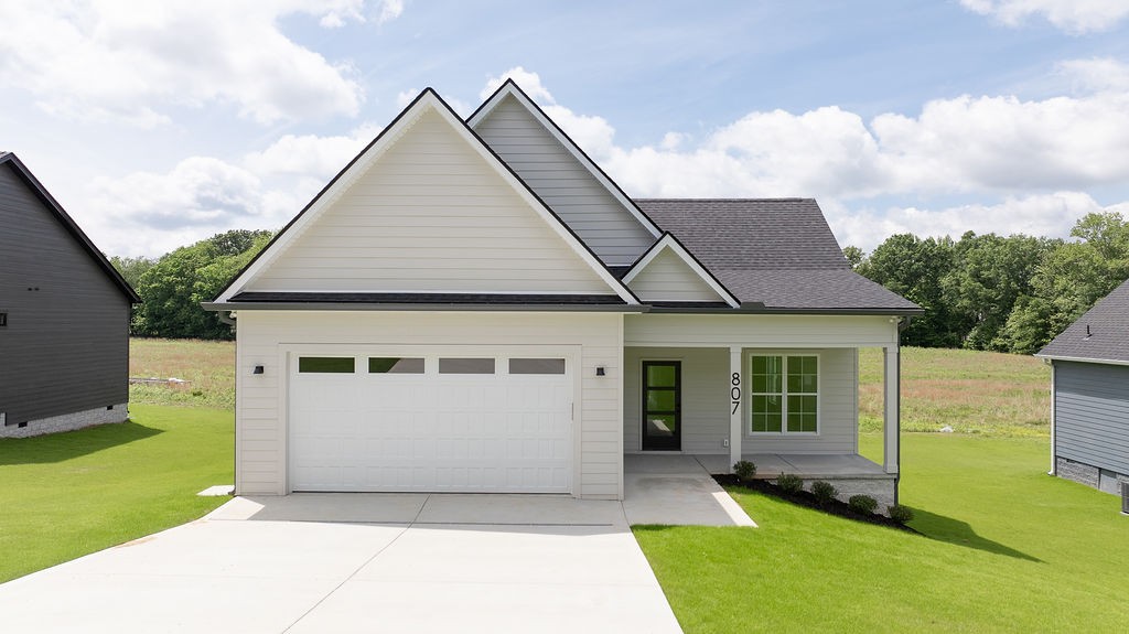 807 Oconner Smithville, TN 37166 - Photo 1 of 33 a view of a house with backyard