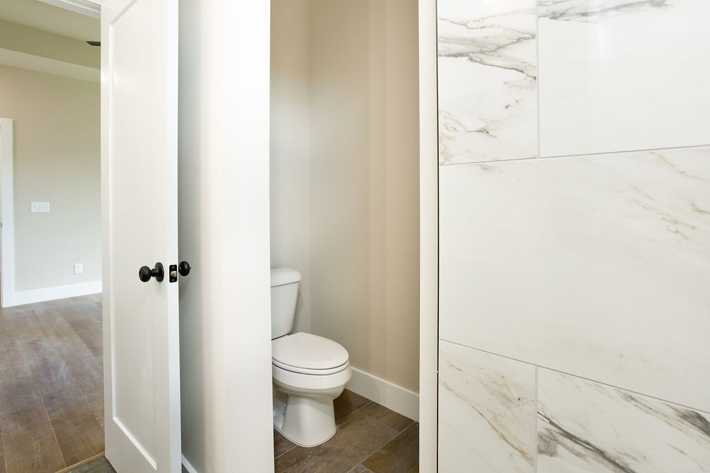 807 Oconner Smithville, TN 37166 - Photo 14 of 33 a bathroom with a toilet and a shower