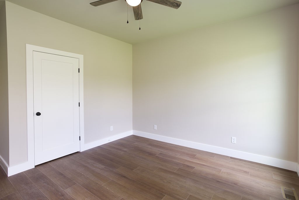 807 Oconner Smithville, TN 37166 - Photo 19 of 33 a view of an empty room with wooden floor