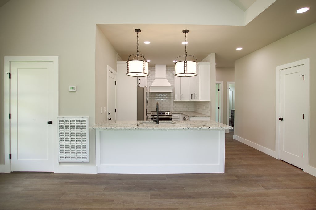 807 Oconner Smithville, TN 37166 - Photo 6 of 33 a view of kitchen with cabinets and wooden floor