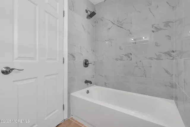 a bathroom with a bathtub