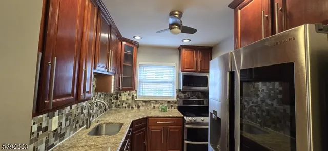 a view of an entryway with outdoor seating