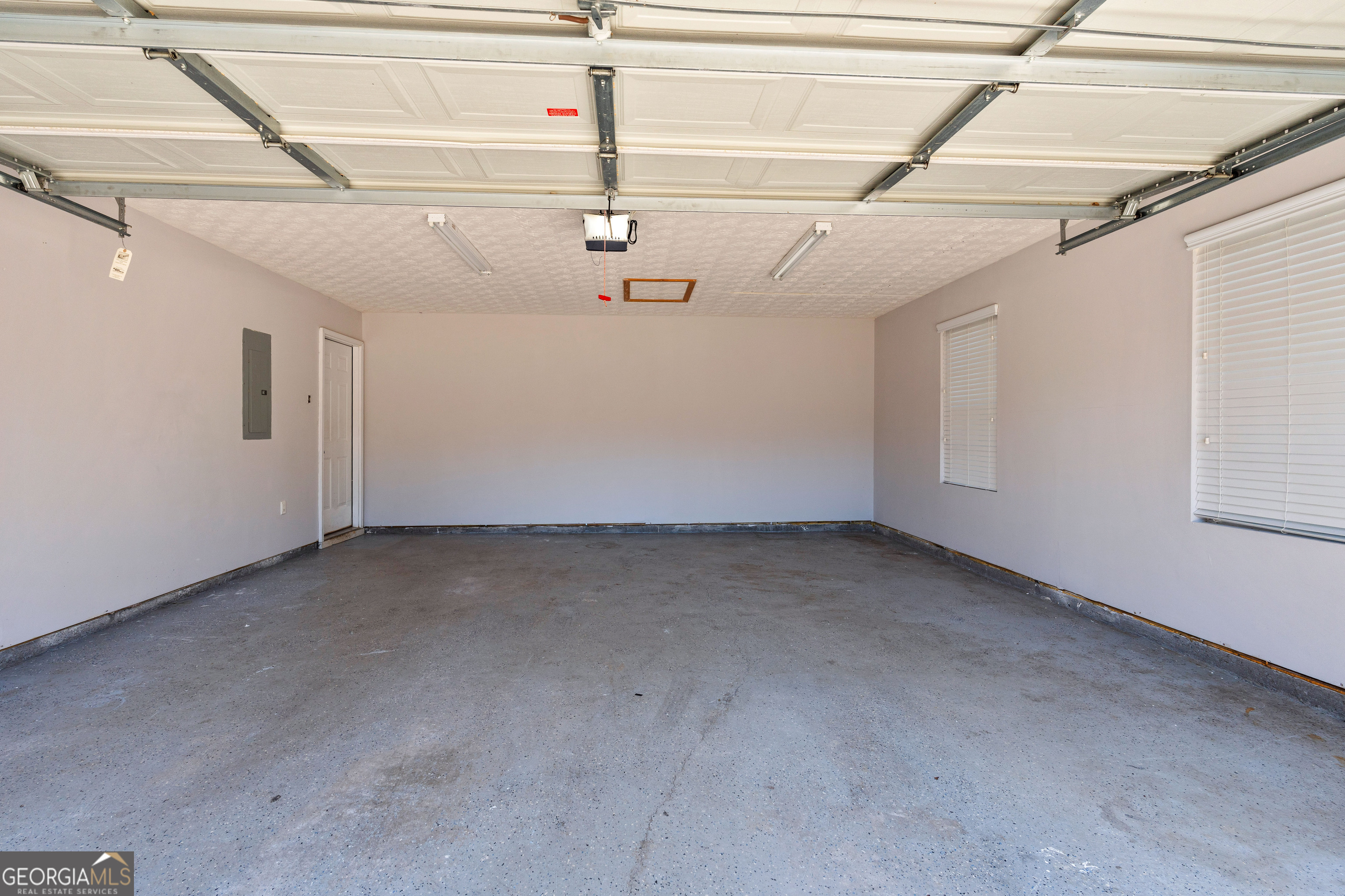 47 Matthews Street Senoia, GA 30276 - Photo 24 of 27 a view of a garage