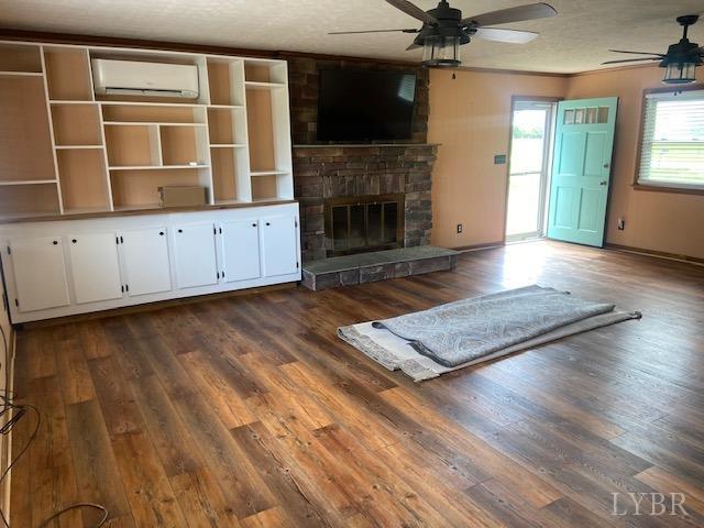 2836 Red House Road Rustburg, VA 24588 - Photo 15 of 74 an empty room with wooden floor fireplace and windows